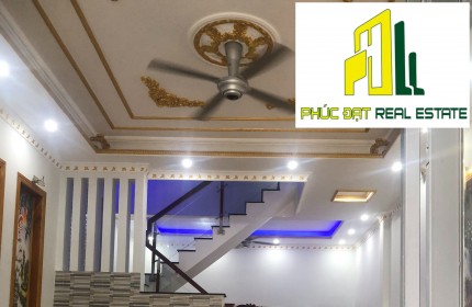 Bán nhà 1 trệt 1 lầu 90m2 Hóa An ,SHR thổ cư đường thông 2 xe hơi,gần nhà thờ Hóa An